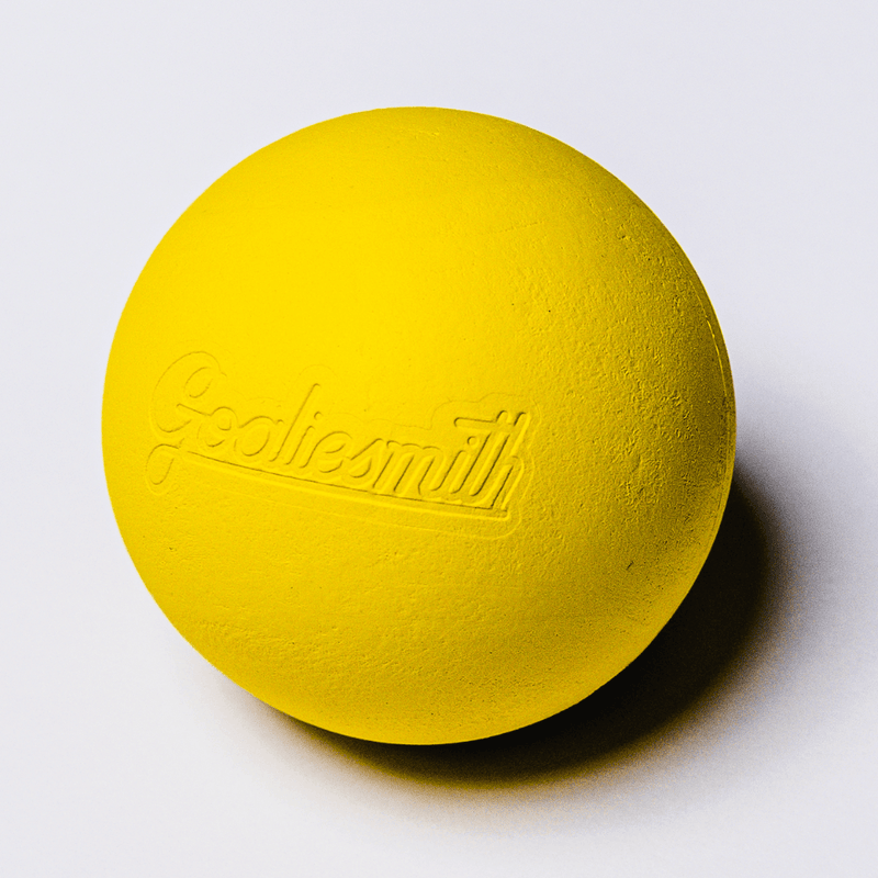Bright yellow soft lacrosse practice ball with embossed Goaliesmith logo